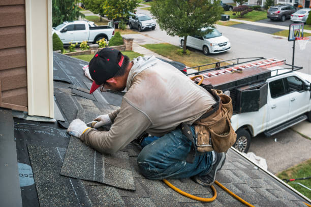Professional Roofing technician working in Stanton, IA